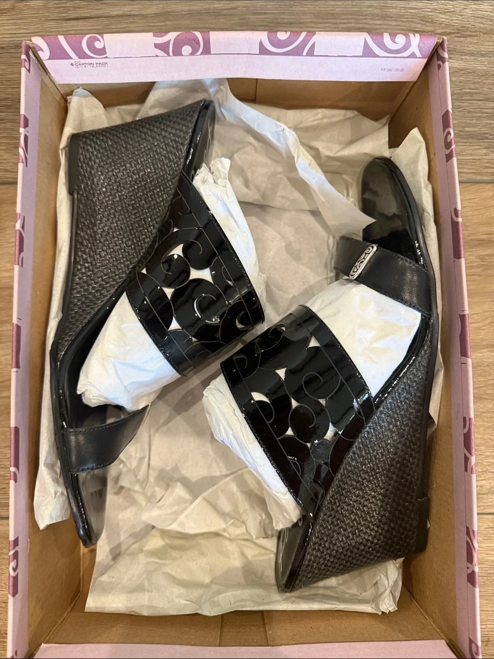 Brighton Black Rhumba Patent Swirl Wedge Sandals
